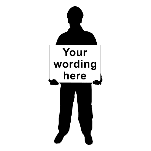 Silhouette of a person holding a sign