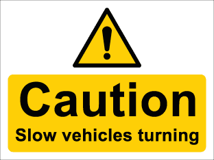 Caution Slow vehicles turning
