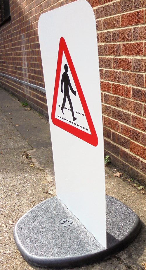 thin aluminium sign in a weighted base